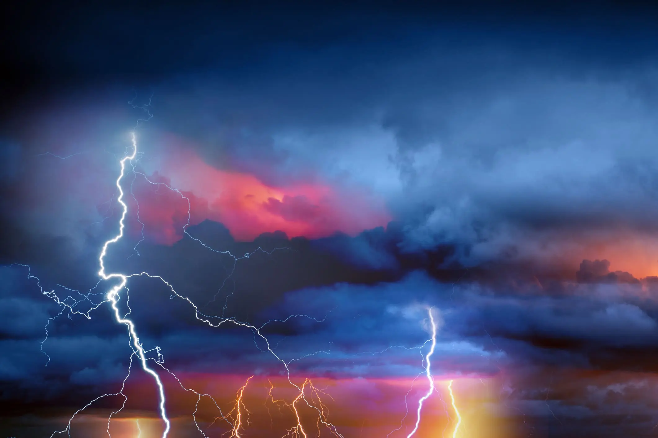 Lightning during summer storm Image of Storm to showcase offering of emergency tree services